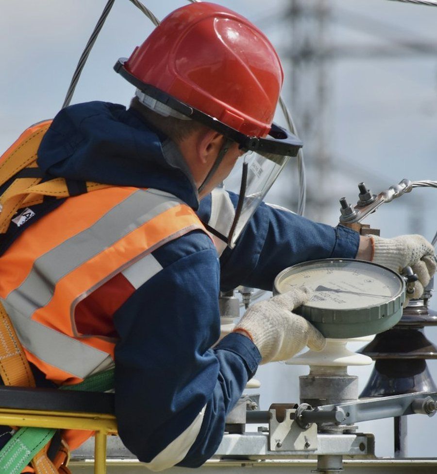 Field engineer maintaining network equipment